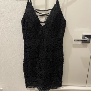 Never worn black lace up dress